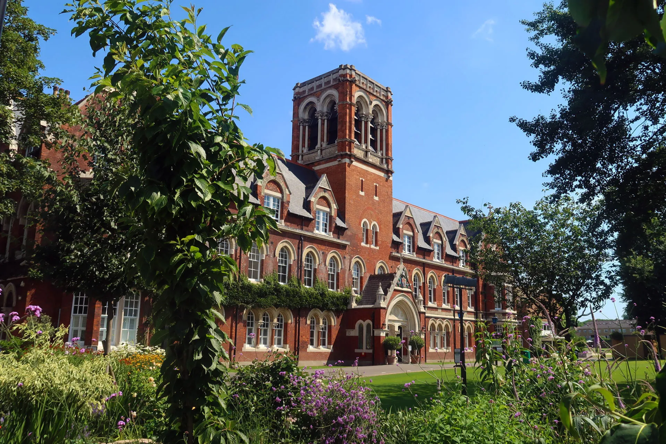 Red-brick school buildings and gardens at Emanuel School